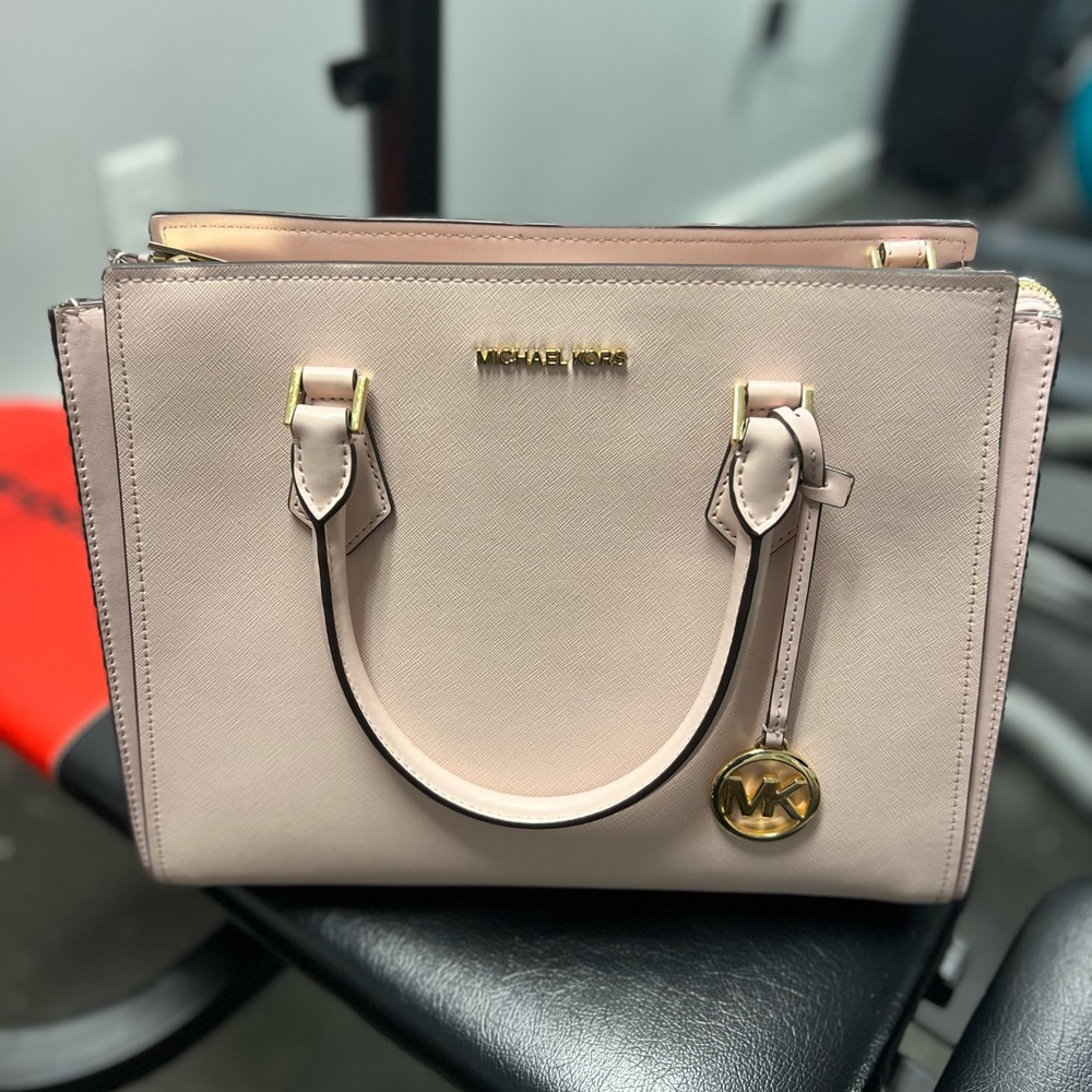 Gently used Michael Kors purse in pink